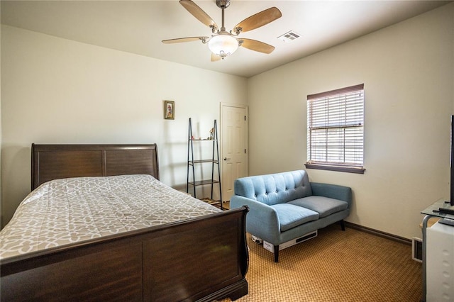 3417 Lyle Rd, Weatherford, OK 73096 - carpeted bedroom featuring baseboards and ceiling fan