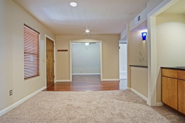600 NW 4th St Unit 319N, Oklahoma City, OK 73102 - unfurnished dining area featuring carpet and baseboards