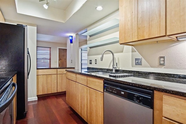 600 NW 4th St Unit 319N, Oklahoma City, OK 73102 - kitchen with appliances with stainless steel finishes, light brown cabinets, dark wood-type flooring, dark stone counters, and a raised ceiling