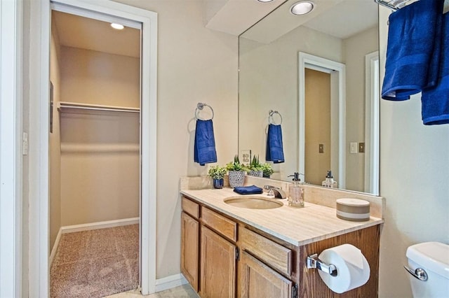 600 NW 4th St Unit 319N, Oklahoma City, OK 73102 - bathroom with vanity and a spacious closet