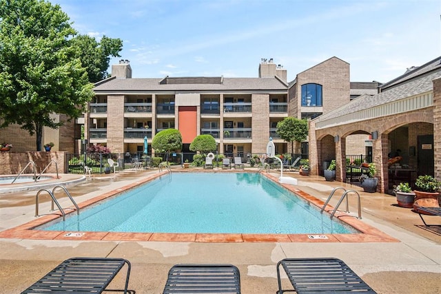 600 NW 4th St Unit 319N, Oklahoma City, OK 73102 - community pool featuring a patio area
