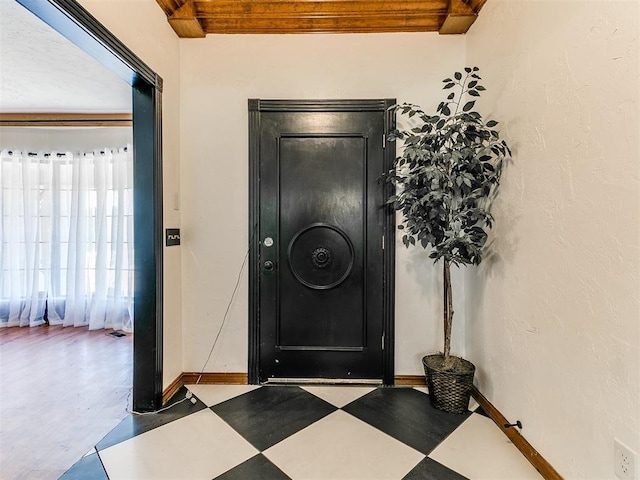 4205 Sooner Cir, Edmond, OK 73034 - foyer entrance with tile patterned floors and baseboards