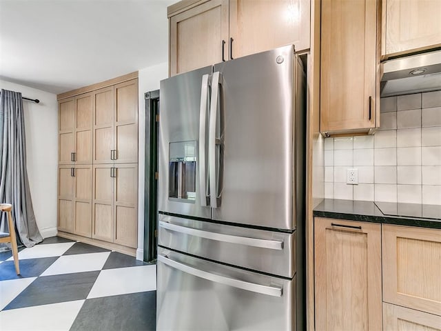 4205 Sooner Cir, Edmond, OK 73034 - kitchen featuring stainless steel fridge with ice dispenser, light brown cabinets, dark floors, and under cabinet range hood