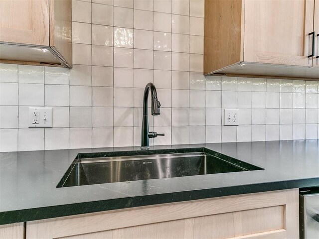4205 Sooner Cir, Edmond, OK 73034 - kitchen view of a sink and tasteful backsplash