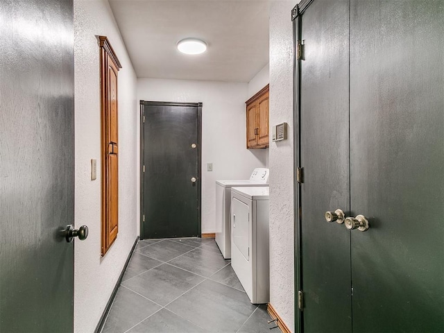 4205 Sooner Cir, Edmond, OK 73034 - washroom featuring independent washer and dryer, tile patterned flooring, cabinet space, and baseboards