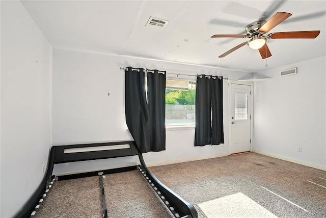 6005 NW Kingston Rd, Oklahoma City, OK 73122 - unfurnished bedroom featuring carpet, a ceiling fan, and baseboards
