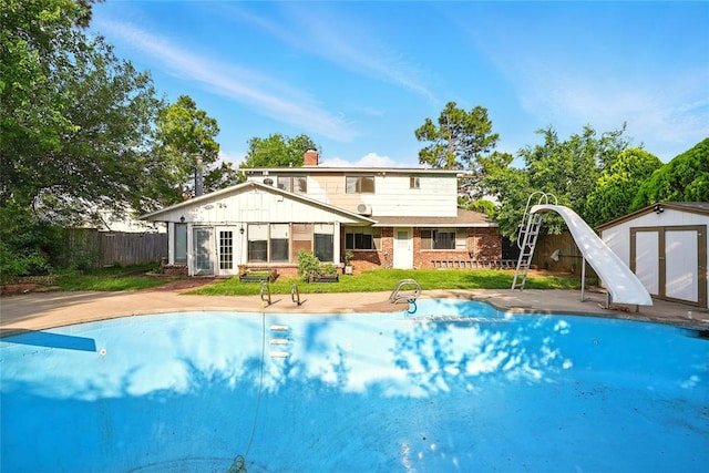 6005 NW Kingston Rd, Oklahoma City, OK 73122 - view of pool featuring a water slide