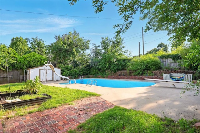 6005 NW Kingston Rd, Oklahoma City, OK 73122 - view of pool featuring a water slide, a diving board, and a patio area
