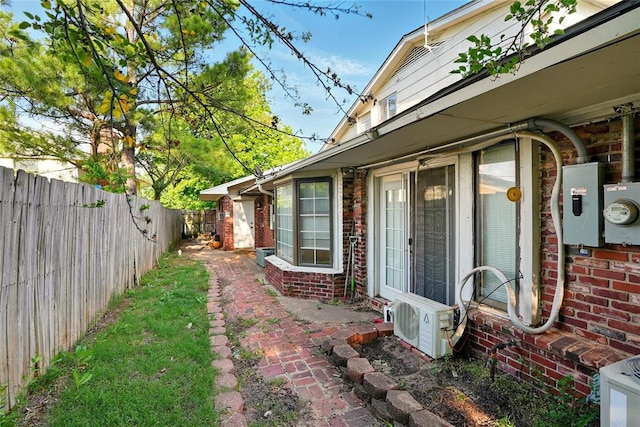6005 NW Kingston Rd, Oklahoma City, OK 73122 - view of yard with ac unit and a patio area