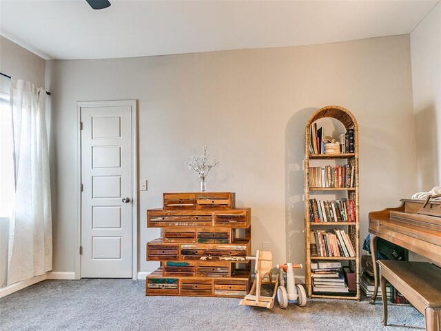 1604 NW 29th St, Oklahoma City, OK 73106 - living area with carpet floors, arched walkways, and baseboards