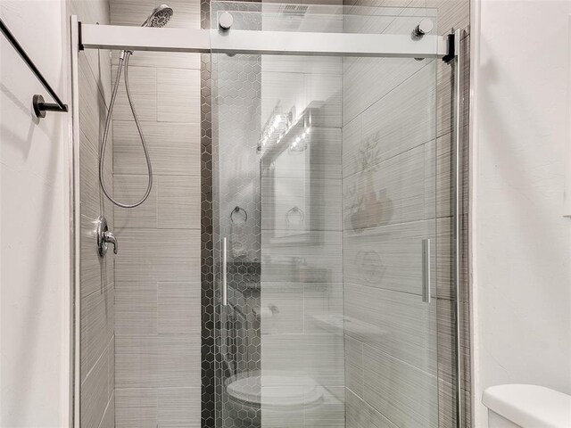 1604 NW 29th St, Oklahoma City, OK 73106 - bathroom with toilet and a shower stall