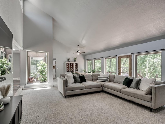 5101 Long Branch Ln, Edmond, OK 73034 - living room with carpet, high vaulted ceiling, a ceiling fan, and plenty of natural light