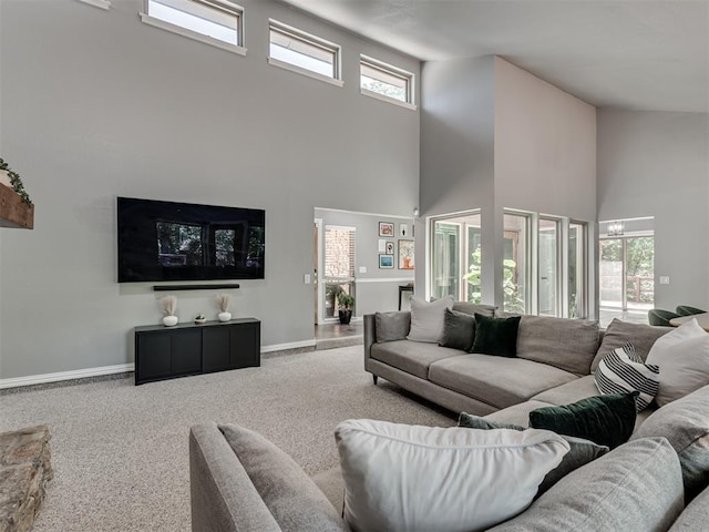 5101 Long Branch Ln, Edmond, OK 73034 - living area featuring a towering ceiling and carpet