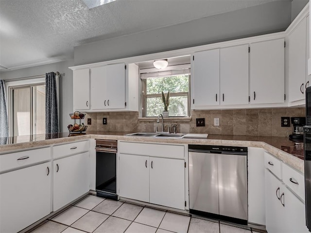 5101 Long Branch Ln, Edmond, OK 73034 - kitchen featuring dishwasher, white cabinetry, tasteful backsplash, tile counters, and light tile patterned flooring