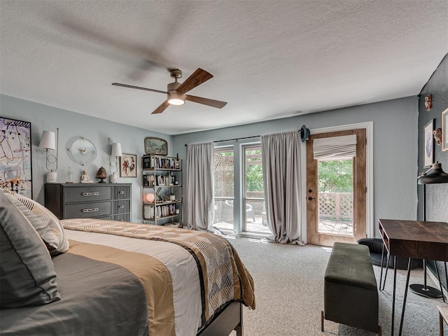 5101 Long Branch Ln, Edmond, OK 73034 - bedroom with access to exterior, carpet floors, a textured ceiling, and a ceiling fan
