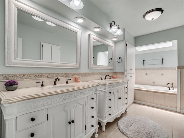 5101 Long Branch Ln, Edmond, OK 73034 - bathroom with vanity, tile patterned flooring, and a bath