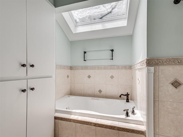 5101 Long Branch Ln, Edmond, OK 73034 - full bathroom featuring a skylight and a garden tub
