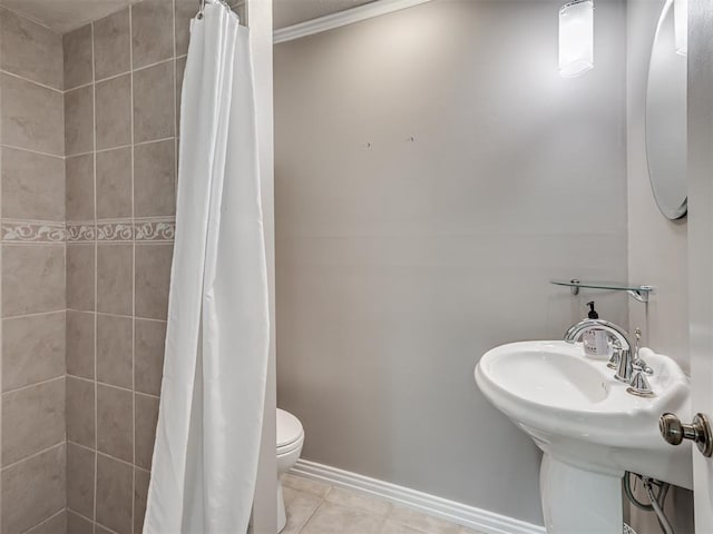5101 Long Branch Ln, Edmond, OK 73034 - full bathroom with a tile shower, crown molding, and tile patterned floors