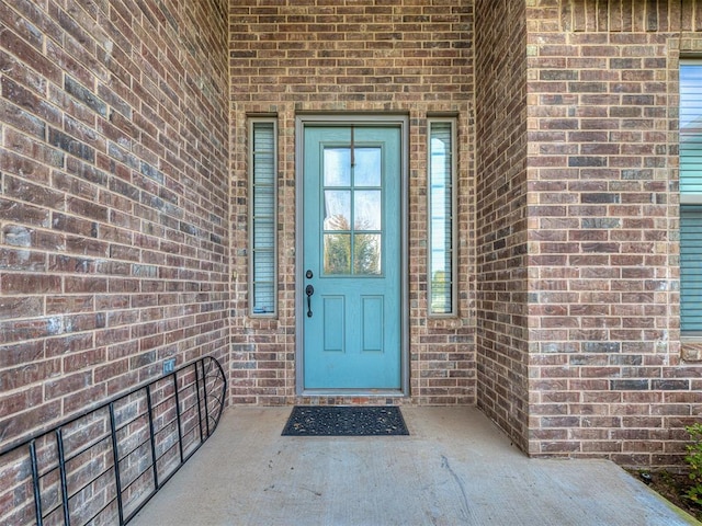 5608 Courtland Ln, Choctaw, OK 73020 - property entrance featuring brick siding
