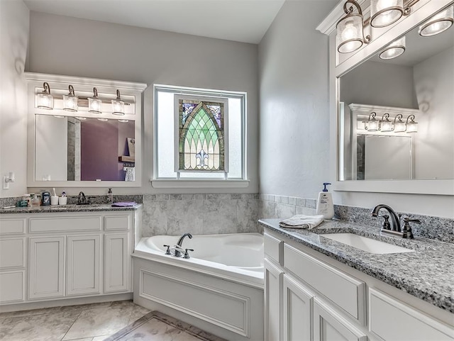 5608 Courtland Ln, Choctaw, OK 73020 - bathroom featuring vanity and a garden tub