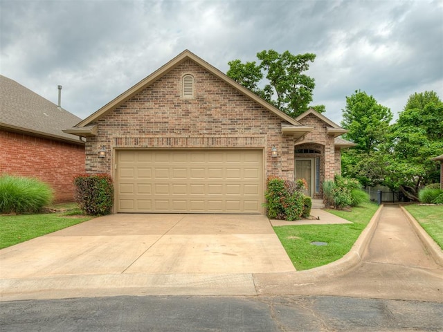 4033 NE 138th St, Edmond, OK 73013 - traditional-style home featuring driveway, brick siding, and a garage