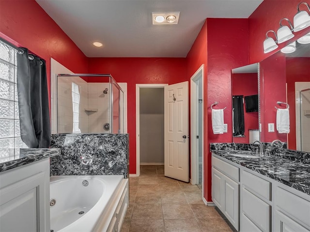 4033 NE 138th St, Edmond, OK 73013 - full bathroom featuring a stall shower, a tub with jets, vanity, and tile patterned floors