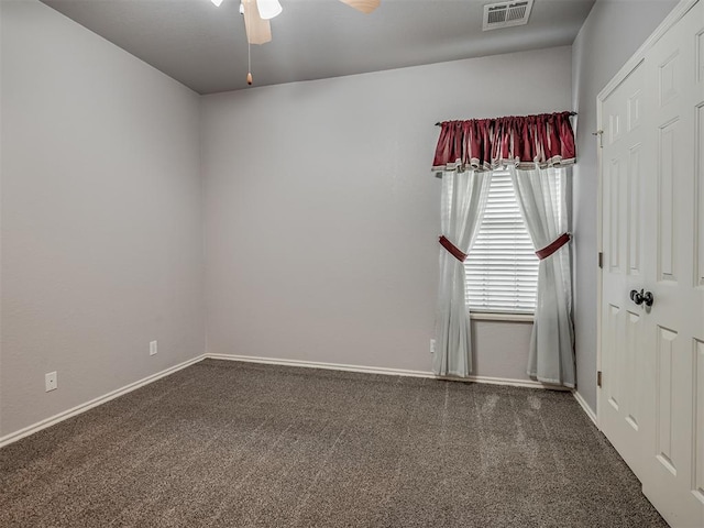 4033 NE 138th St, Edmond, OK 73013 - empty room featuring carpet floors, a ceiling fan, and baseboards