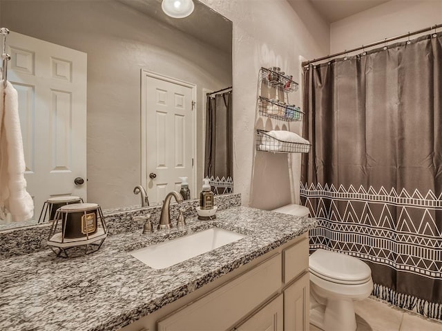 4033 NE 138th St, Edmond, OK 73013 - bathroom featuring vanity, toilet, tile patterned flooring, a shower with curtain, and a textured wall
