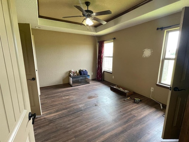 103 Thurman Dr, Walters, OK 73572 - spare room featuring a raised ceiling, wood finished floors, and ceiling fan