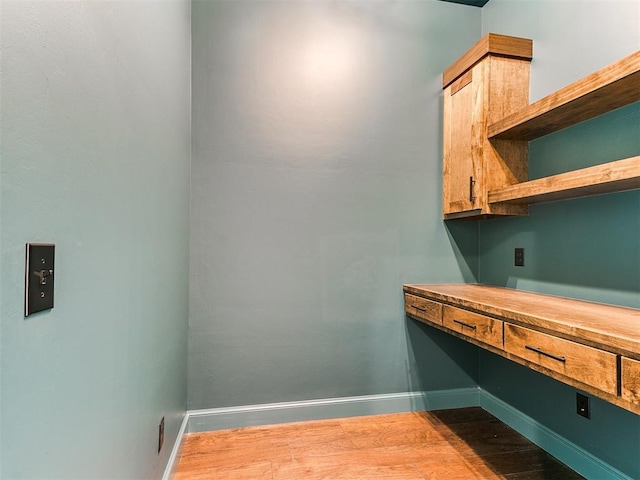9316 NW 84th St, Yukon, OK 73099 - unfurnished office featuring dark wood finished floors and baseboards