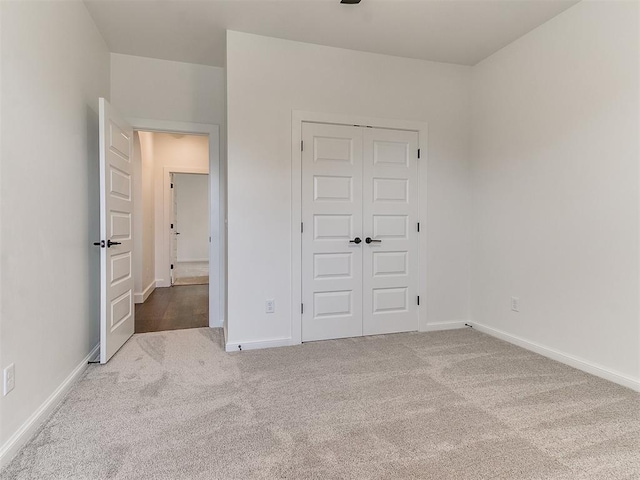 9316 NW 84th St, Yukon, OK 73099 - unfurnished bedroom with carpet floors, a closet, and baseboards