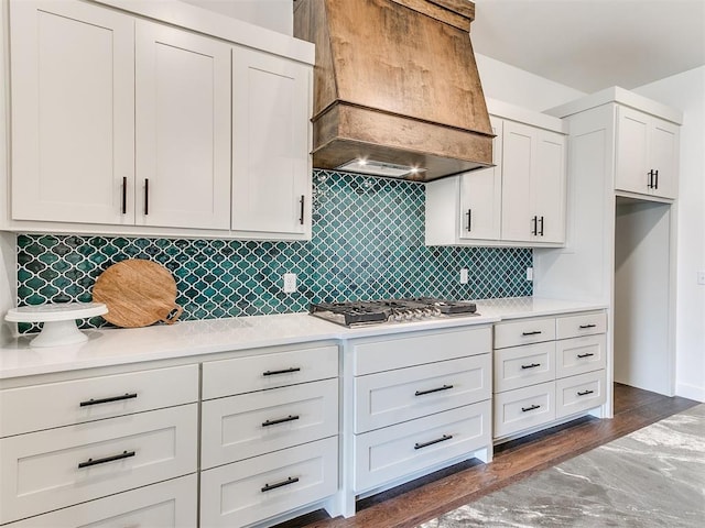 9316 NW 84th St, Yukon, OK 73099 - kitchen featuring custom range hood, stainless steel gas stovetop, light countertops, tasteful backsplash, and white cabinets