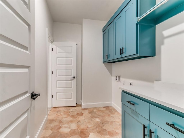 9316 NW 84th St, Yukon, OK 73099 - laundry area with cabinet space, hookup for a washing machine, baseboards, and electric dryer hookup