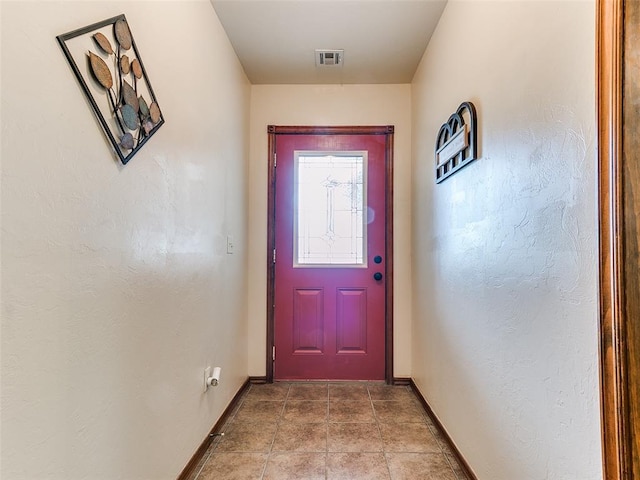 409 NW Jefferson Ave, Piedmont, OK 73078 - doorway to outside with baseboards