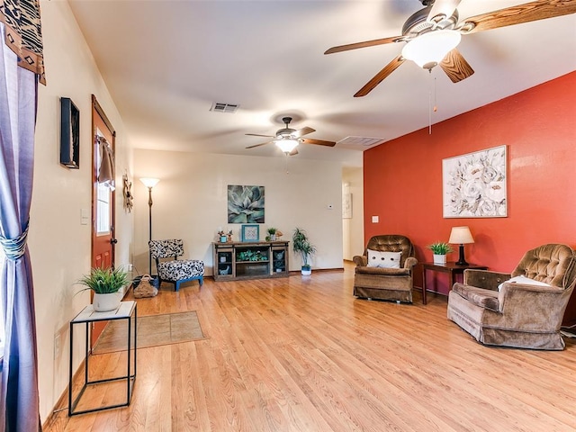 409 NW Jefferson Ave, Piedmont, OK 73078 - living area with a ceiling fan and wood finished floors