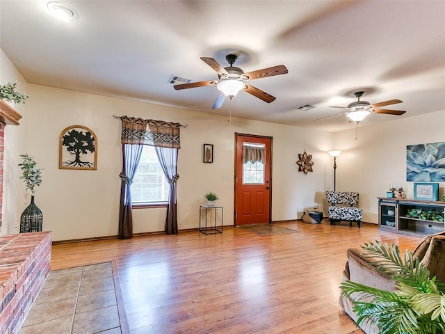 409 NW Jefferson Ave, Piedmont, OK 73078 - foyer featuring ceiling fan, light wood-style floors, and baseboards