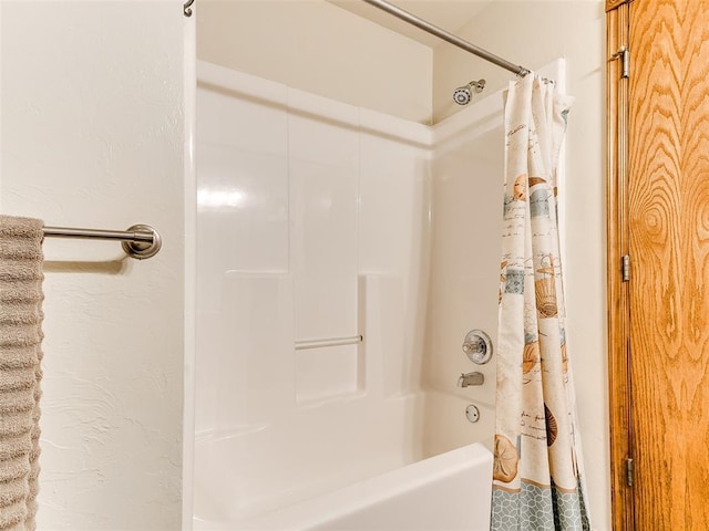 409 NW Jefferson Ave, Piedmont, OK 73078 - bathroom with shower / bath combo with shower curtain