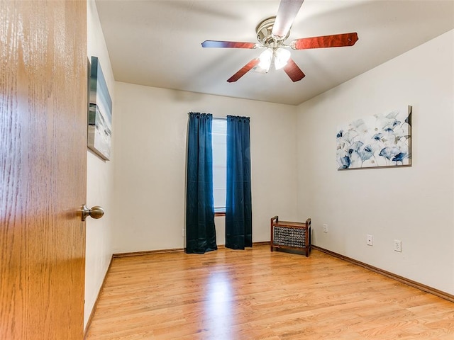 409 NW Jefferson Ave, Piedmont, OK 73078 - unfurnished room with ceiling fan, light wood-style flooring, and baseboards