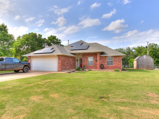 409 NW Jefferson Ave, Piedmont, OK 73078 - view of front of property featuring brick siding, a garage, solar panels, driveway, and roof with shingles