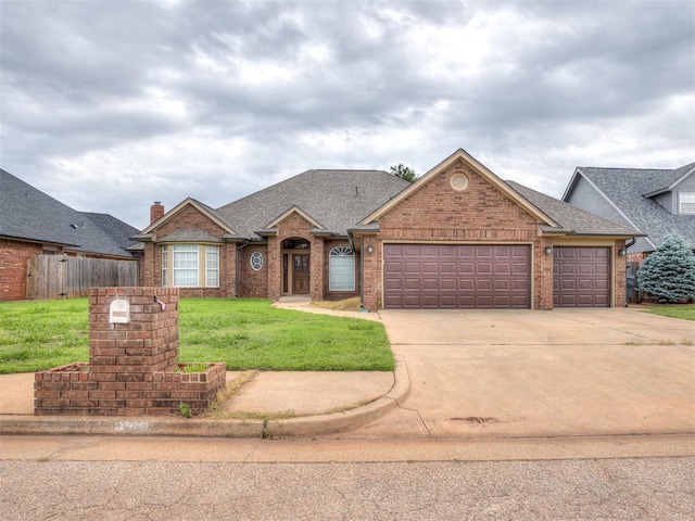 2708 NW 158th St, Edmond, OK 73013 - traditional-style home featuring an attached garage, brick siding, driveway, and a shingled roof