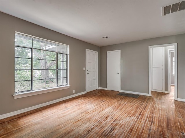4109 N Sterling Ave, Oklahoma City, OK 73122 - unfurnished room with baseboards and wood finished floors