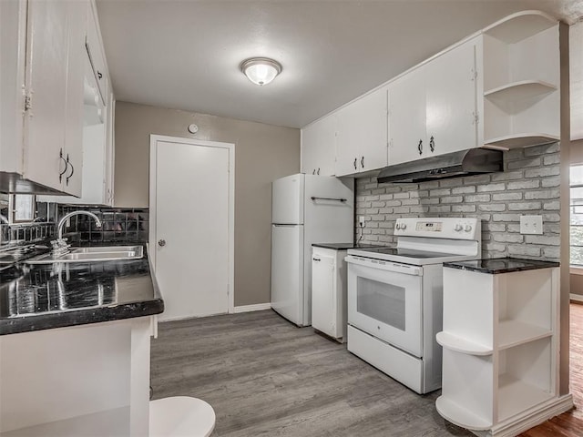 4109 N Sterling Ave, Oklahoma City, OK 73122 - kitchen featuring white appliances, open shelves, under cabinet range hood, and dark countertops