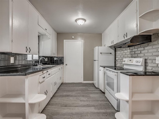 4109 N Sterling Ave, Oklahoma City, OK 73122 - kitchen with open shelves, white appliances, tasteful backsplash, white cabinetry, and dark countertops
