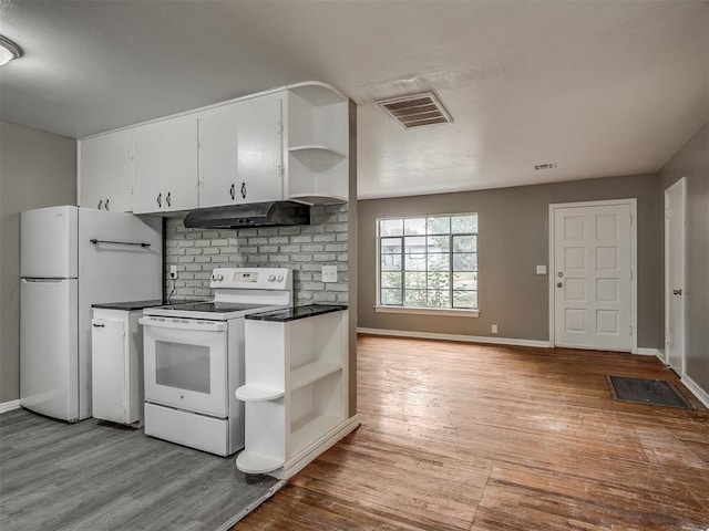 4109 N Sterling Ave, Oklahoma City, OK 73122 - kitchen featuring open shelves, white appliances, under cabinet range hood, and dark countertops