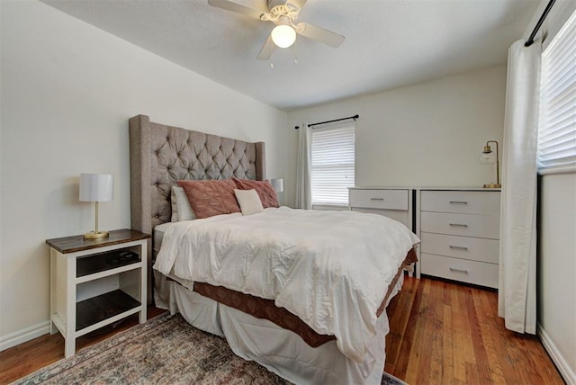 2805 SW 54th Pl, Oklahoma City, OK 73119 - bedroom featuring wood finished floors, baseboards, and a ceiling fan