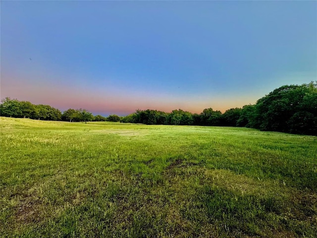 36578 Ns 3500th St, Konawa, OK 74849 - yard at dusk with a view of countryside