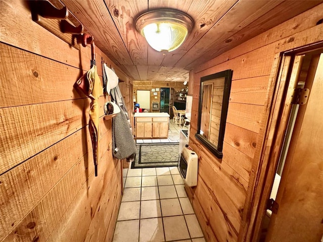 36578 Ns 3500th St, Konawa, OK 74849 - corridor with wooden walls, light tile patterned floors, and heating unit