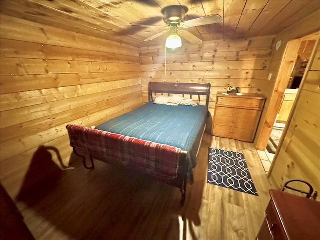 36578 Ns 3500th St, Konawa, OK 74849 - bedroom with wooden ceiling, light wood finished floors, wooden walls, and a ceiling fan