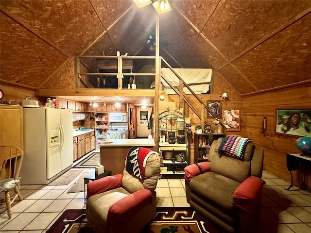 36578 Ns 3500th St, Konawa, OK 74849 - living room featuring vaulted ceiling, light tile patterned floors, and wood walls