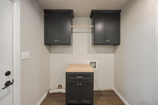 325 S Pine St, Crescent, OK 73028 - laundry room featuring hookup for a washing machine, dark wood-type flooring, cabinet space, and baseboards